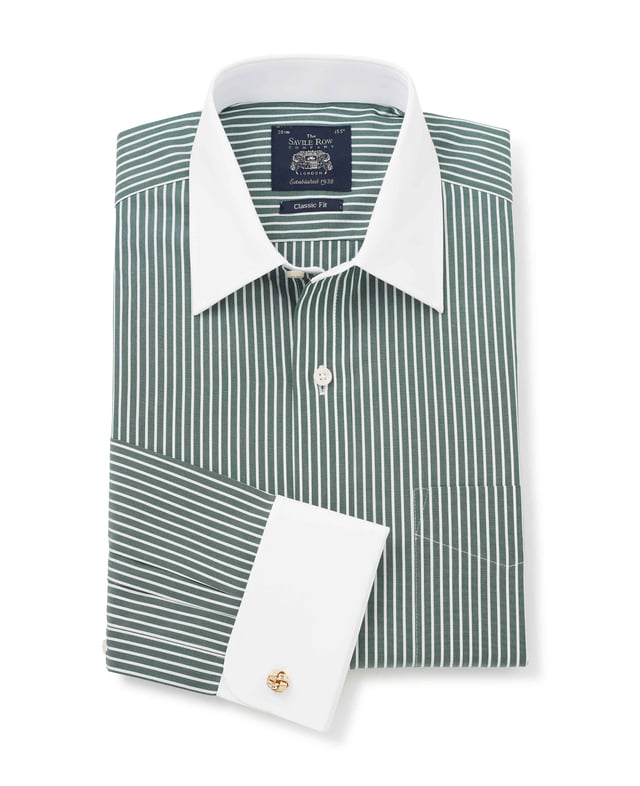 A nod to classic Winchester heritage, this dark green formal shirt features bold reverse stripes paired with a crisp white collar and matching cuffs. Crafted from 100% cotton for lasting comfort, it's the ultimate statement piece for the office - where tradition meets unmistakable style. Contrast white curl resistant Windsor collar, with an integral and removable collar stay. 100% BCI cotton poplin; smooth to the touch, classic reverse stripe design. Generously proportioned classic fit. Curl resistant Windsor collar. Contrast white collar and cuffs. Split yoke, long tails, chest pocket. Machine washable at 40°C. We advise washing with a colour catcher for best results.
