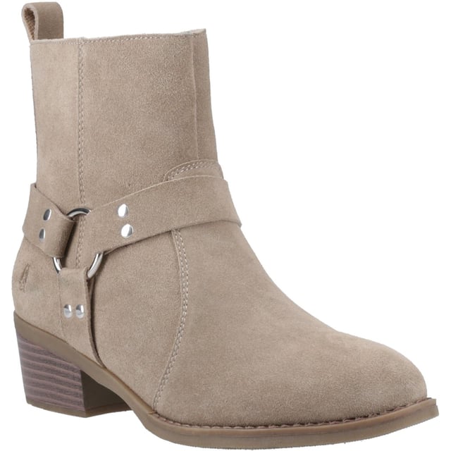Hush Puppies Iria Suede Women's Taupe Heeled Ankle Boots Kick up your style with the Iria Boot! Real suede, a chic Western buckle, and a comfy block heel make it perfect for nailing the cowboy trend. These ankle boots are made for all-day adventures with our WorryFree water repellent protection.