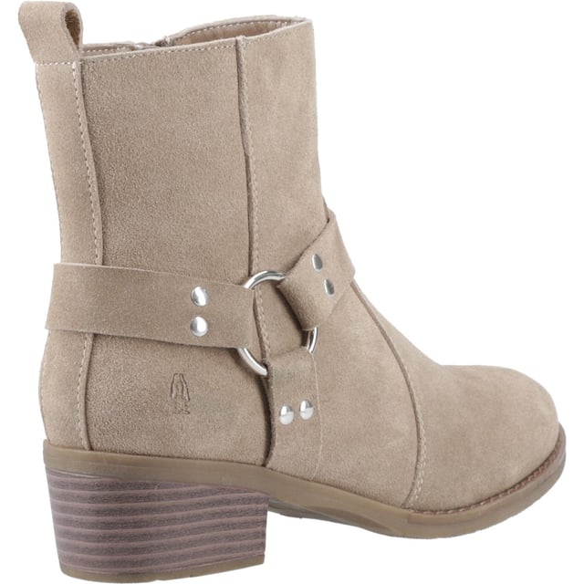 Hush Puppies Iria Suede Women's Taupe Heeled Ankle Boots Kick up your style with the Iria Boot! Real suede, a chic Western buckle, and a comfy block heel make it perfect for nailing the cowboy trend. These ankle boots are made for all-day adventures with our WorryFree water repellent protection.