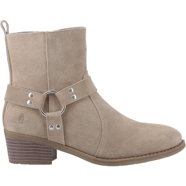Hush Puppies Iria Suede Women's Taupe Heeled Ankle Boots Kick up your style with the Iria Boot! Real suede, a chic Western buckle, and a comfy block heel make it perfect for nailing the cowboy trend. These ankle boots are made for all-day adventures with our WorryFree water repellent protection.