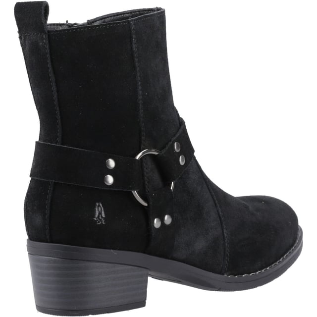 Hush Puppies Iria Suede Women's Black Heeled Ankle Boots Kick up your style with the Iria Boot! Real suede, a chic Western buckle, and a comfy block heel make it perfect for nailing the cowboy trend. These ankle boots are made for all-day adventures with our WorryFree water repellent protection.