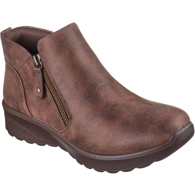 Stijlvolle uitstraling en comfortabele warmte komen samen in de Skechers Lovely Vibe Fall In Bloom. Deze enkellaars met rits heeft een microleren bovenwerk en een gevoerde Skechers Air-Cooled Memory Foam inlegzool.