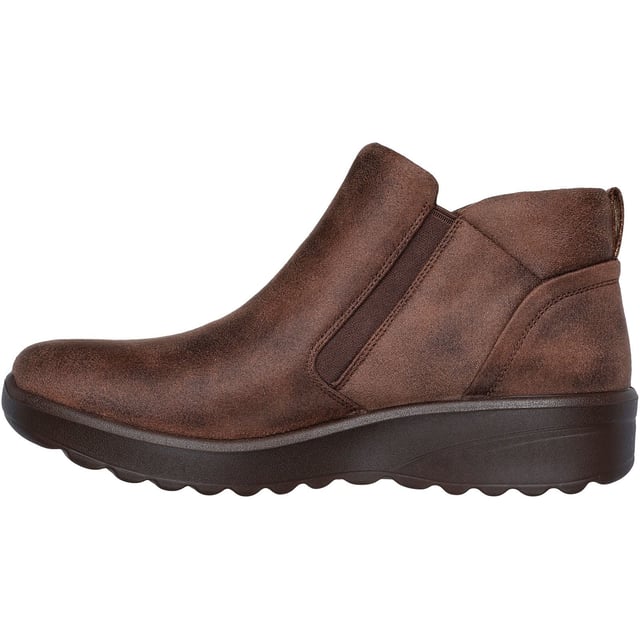 Stijlvolle uitstraling en comfortabele warmte komen samen in de Skechers Lovely Vibe Fall In Bloom. Deze enkellaars met rits heeft een microleren bovenwerk en een gevoerde Skechers Air-Cooled Memory Foam inlegzool.