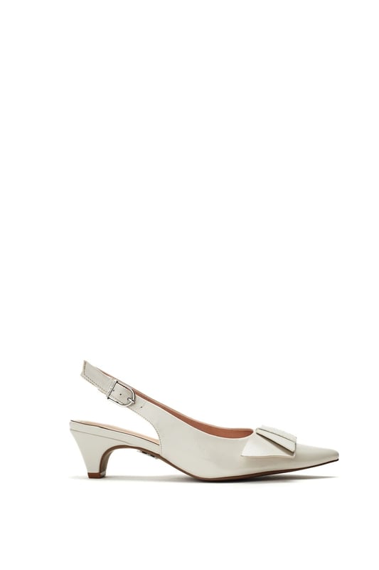 Navigate the season in Nutmeg, the slingback, kitten-heel sandal. This style features a chic pointed toe with a bow embellishment. The low heel provides wearable height, whilst the leather lining ensures all-day comfort.