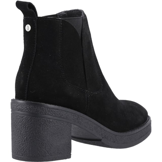 Hush Puppies Felicia Suede Women's Black Heeled Chelsea Boots Say hello to effortless style with the Felicia Boot! Crafted from real suede, this ankle boot boasts a cosy fleece lining, block heel, and WorryFree water repellent protection - perfect for all-day wear. Walk more and worry less in style.