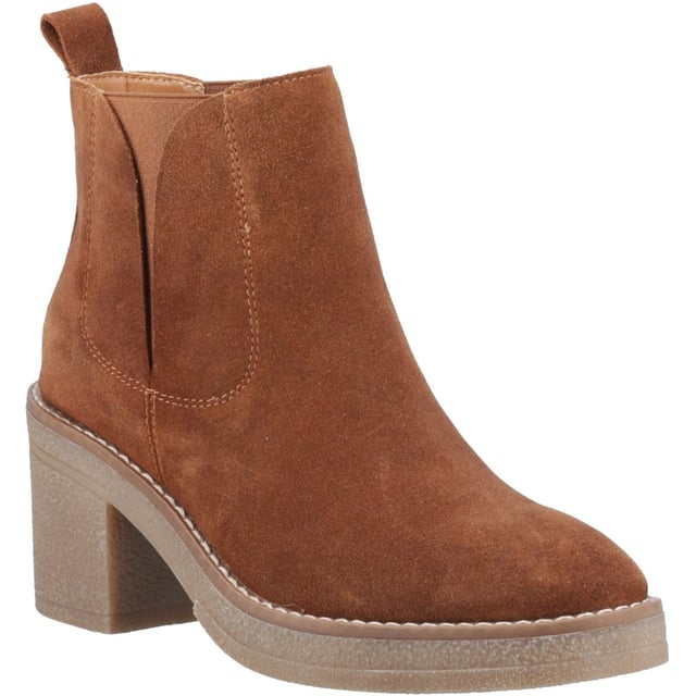 Hush Puppies Felicia Suede Women's Tan Heeled Chelsea Boots Say hello to effortless style with the Felicia Boot! Crafted from real suede, this ankle boot boasts a cosy fleece lining, block heel, and WorryFree water repellent protection - perfect for all-day wear. Walk more and worry less in style.