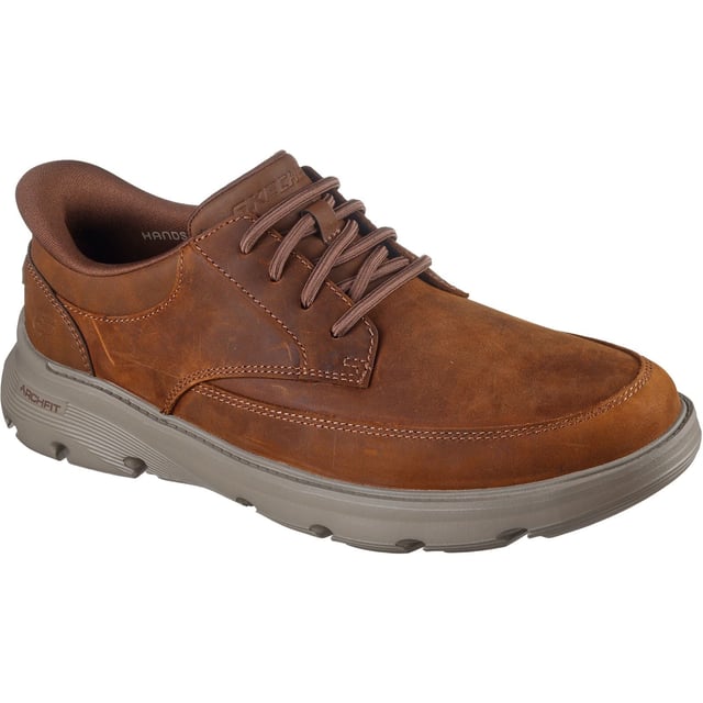Skechers Arch Fit Garza Rowan Leren Heren Donkerbruine Veterschoenen Ga moeiteloos van je bureau naar het diner in de Skechers Arch Fit Garza - Rowan. Deze zakelijke casual schoen is ontworpen met onze exclusieve Heel Pillow, heeft een bovenwerk van leer en synthetisch materiaal met vaste rekveters en een luchtgekoelde Arch Fit-innenzool.