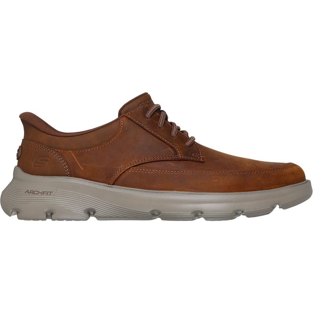 Skechers Arch Fit Garza Rowan Leren Heren Donkerbruine Veterschoenen Ga moeiteloos van je bureau naar het diner in de Skechers Arch Fit Garza - Rowan. Deze zakelijke casual schoen is ontworpen met onze exclusieve Heel Pillow, heeft een bovenwerk van leer en synthetisch materiaal met vaste rekveters en een luchtgekoelde Arch Fit-innenzool.