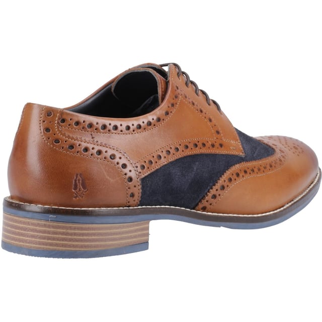 Hush Puppies Dustin Leather/Suede Men's Tan/Navy Brogues Shoes The Dustin Brogue; Features Ortholite Technology Comfort Insoles with a leather sock and lining. This Classic Brogue includes a subtle padded collar with contrasting rand detail, and the mixed textile and quality leather upper adds a stylish twist