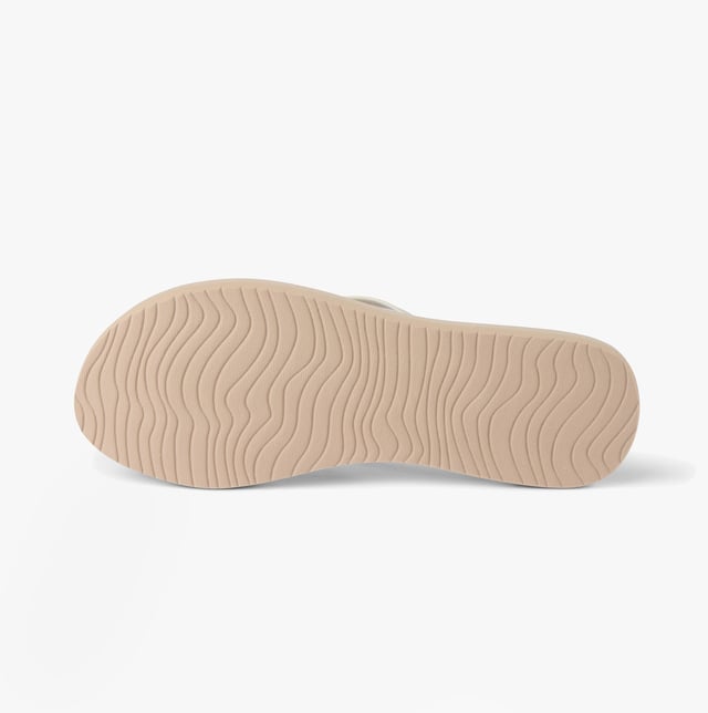 These vegan flip-flop sandals feature a faux leather upper, EVA lining, and rubber sole for comfort and casual wear. They are lightweight and easy to slip on