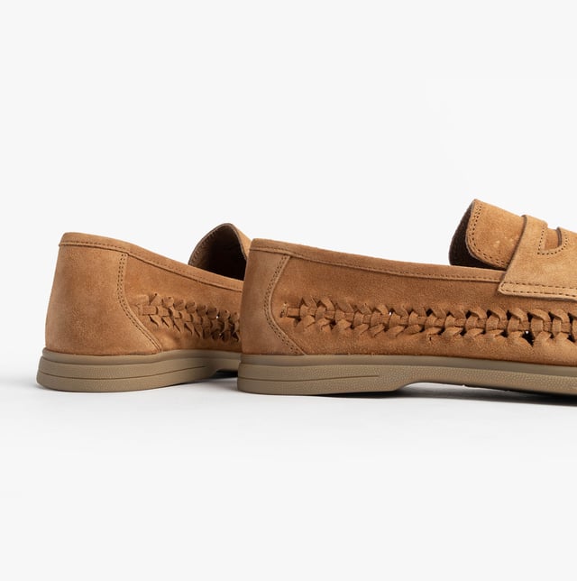These men's loafers feature a suede upper, textile lining, and rubber sole with a slip-on design and almond-shaped toe, offering comfortable casual wear