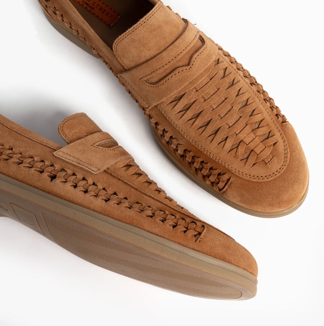 These men's loafers feature a suede upper, textile lining, and rubber sole with a slip-on design and almond-shaped toe, offering comfortable casual wear