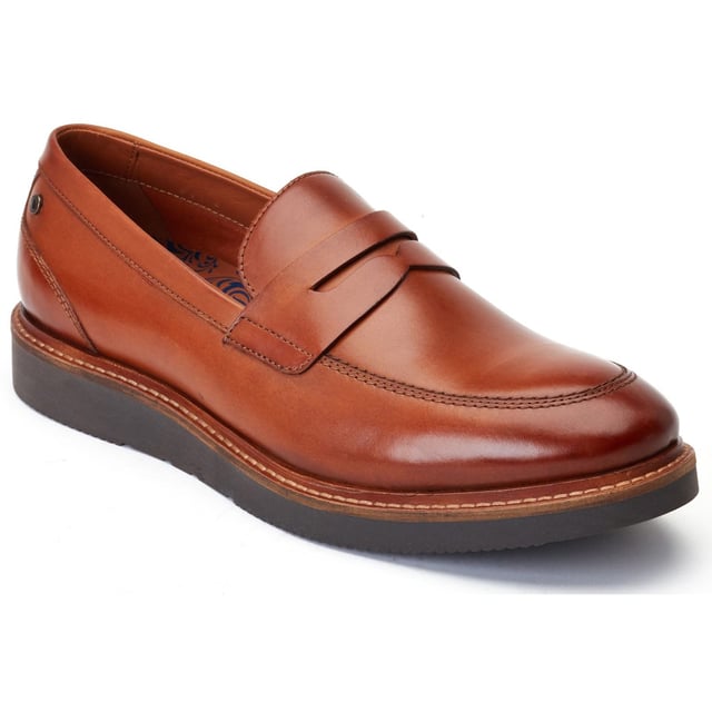 Base London Sid Leren Heren Tan Loafers Sid is een moderne penny loafer van Base London. Met zijn rijke gewassen leren bovenwerk en eigentijdse wigzool geeft Sid je het vertrouwen dat je nodig hebt om je outfit naar een hoger niveau te tillen en op te vallen in de menigte.