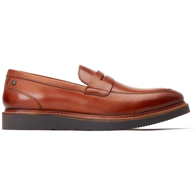 Base London Sid Leren Heren Tan Loafers Sid is een moderne penny loafer van Base London. Met zijn rijke gewassen leren bovenwerk en eigentijdse wigzool geeft Sid je het vertrouwen dat je nodig hebt om je outfit naar een hoger niveau te tillen en op te vallen in de menigte.