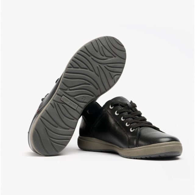 Estas zapatillas de cuero para mujer cuentan con un diseño transpirable y cómodo, con cierre de cordones, punta redonda, caña baja y un tacón plano, ideales para un uso casual.