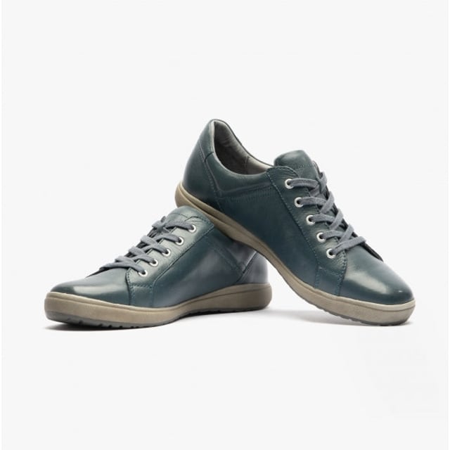 Estas zapatillas de cuero para mujer cuentan con un diseño transpirable y cómodo, con punta redonda, cierre de cordones y un corte bajo, ideales para el uso diario y actividades cotidianas.