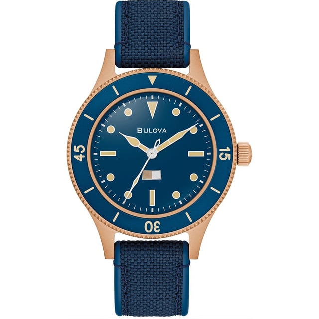 This Bulova Archive Series Mil Ships 150th Anniversary Edition Analogue Watch for Men is the perfect timepiece to wear or to gift. It's Bronze 41 mm Round case combined with the comfortable Blue Silicone watch band will ensure you enjoy this stunning timepiece without any compromise. Operated by a high quality Quartz movement and water resistant to 20 bars, your watch will keep ticking. Honoring Bulova’s military heritage and inspired by a rare 1957 U.S. Navy prototype, the Special Edition MIL-SHIPS Bronze marks Bulova’s 150th Anniversary with a tribute to innovation and craftsmanship. This Analogue watch is equipped with a Luminous Hands and a Screw Down Crown High quality Blue Silicone strap, measuring 21 cm in length and 18 mm in width, with a Buckle. Case diameter: 41 mm,case thickness: 14 mm, case colour: Bronze and dial colour: Blue