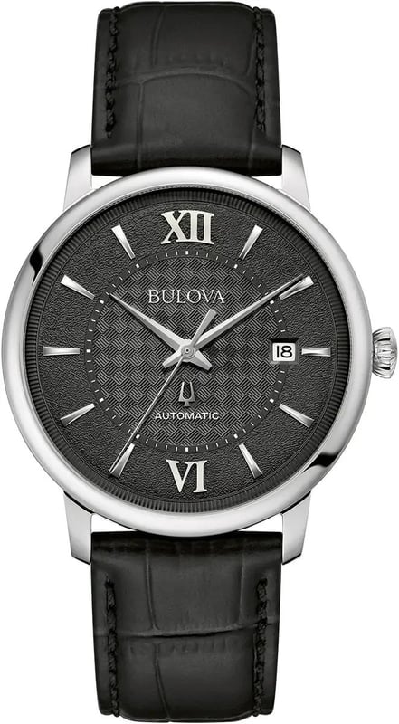 This Bulova Hudson Analogue Watch for Men is the perfect timepiece to wear or to gift. It's Silver 39 mm Round case combined with the comfortable Black Leather watch band will ensure you enjoy this stunning timepiece without any compromise. Operated by a high quality Automatic movement and water resistant to 3 bars, your watch will keep ticking. The new Bulova Hudson is set to be your favorite dress watch. Featuring a fresh case design and detailed dial, it redefines elegance with a refined presence. This Analogue watch features a calendar function: Date and is equipped with High quality Black Leather strap, measuring 21 cm in length and 19 mm in width, with a Buckle. Case diameter: 39 mm,case thickness: 12 mm, case colour: Silver and dial colour: Black