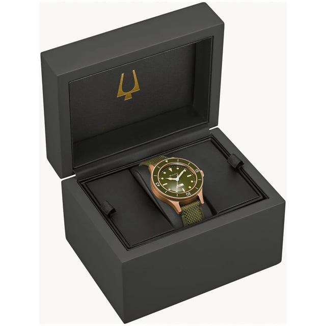 This Bulova Archive Series Mil Ships 150th Anniversary Edition Analogue Watch for Men is the perfect timepiece to wear or to gift. It's Bronze 41 mm Round case combined with the comfortable Green Silicone watch band will ensure you enjoy this stunning timepiece without any compromise. Operated by a high quality Quartz movement and water resistant to 20 bars, your watch will keep ticking. Honoring Bulova’s military legacy and a rare 1957 U.S. Navy prototype, the Special Edition MIL-SHIPS Bronze celebrates Bulova’s 150th Anniversary. This Analogue watch is equipped with a Luminous Hands and a Screw Down Crown High quality Green Silicone strap, measuring 21 cm in length and 18 mm in width, with a Buckle. Case diameter: 41 mm,case thickness: 14 mm, case colour: Bronze and dial colour: Green