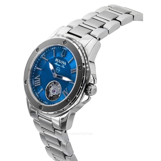 This Bulova Marine Star Analogue Watch for Women is the perfect timepiece to wear or to gift. It's Silver 35 mm Round case combined with the comfortable Silver Stainless steel watch band will ensure you enjoy this stunning timepiece without any compromise. Operated by a high quality Automatic movement and water resistant to 10 bars, your watch will keep ticking. Embrace a bold new you with the chic Bulova ladies’ automatic Marine Star. This Analogue watch is equipped with a Luminous Hands High quality Silver Stainless steel strap, measuring 19 cm in length and 17 mm in width, with a Deployment clasp. Case diameter: 35 mm,case thickness: 10 mm, case colour: Silver and dial colour: Blue