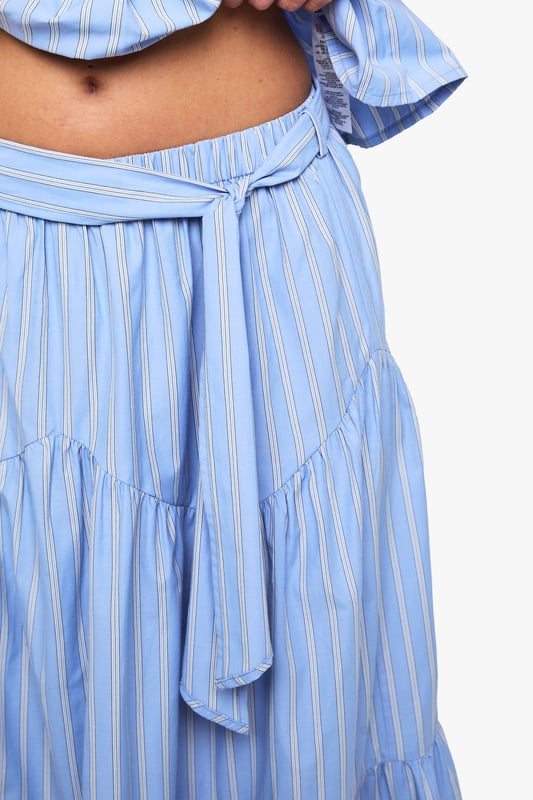 Skirts are the statement separate in every wardrobe This season it's all about having fun with your hemline. Mix it up in minis, midis and maxis or go matchy-matchy and co-ordinate with a crop top. Push the boundaries in pleated pastels and fondant shade full circle styles, updating with a holographic clutch for a cool colour clash. Flirt with the skirt for your favourite every day and evening ensembles.