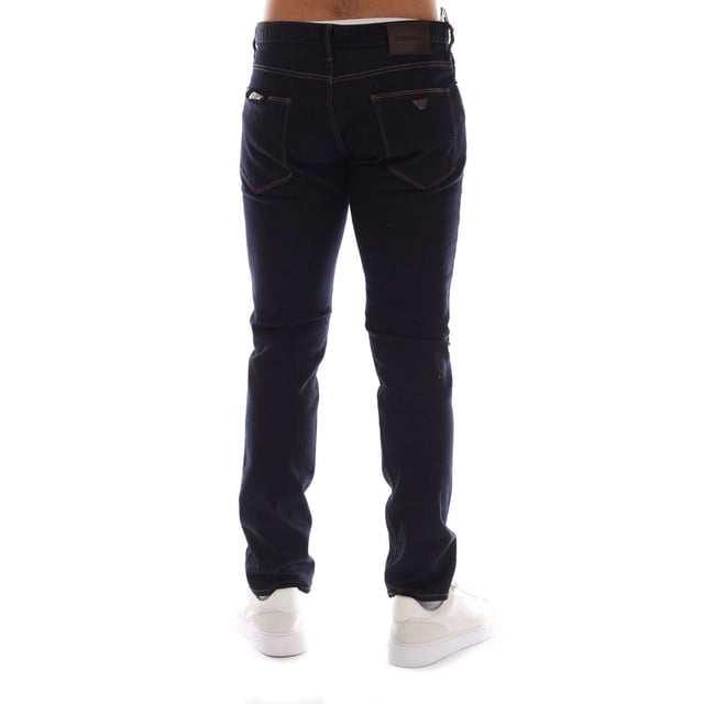 Mens Emporio Armani J06 Slim-Fit Jeans in blue.- Five-pocket styling.- Zip fly and button fastening.- Belt loops.- Leather brand patch.- Slim fit.- 98% Cotton  2% Elastane.- Ref: EM000121AMB001