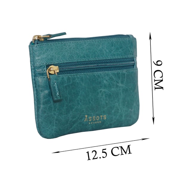 Keep things simple with this small coin purse crafted from super soft and supple natural grain Nappa leather. Featuring a simple compartment that opens along the top, the 'Mary' has a fully lined matching interior that is ideal for the basics. Comes in four more bright colours to spot easily in your bag. Zip top closure. Zip pocket at the front. Embellished with gold metal zippers and an inimitable Assots London golden foil embossed logo. Fittings: Gold Composition: Body: 100% Genuine Leather. Lining: 100% Polyester. DISCLAIMER : All pictures shown are for illustration purpose only. Actual product colour may vary due to different ambience lighting or the screen display settings.