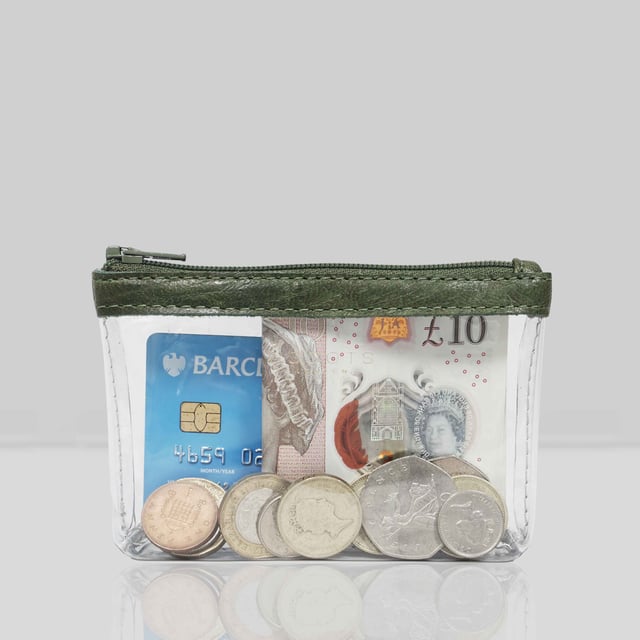 Size:13cm x 8.5cm x 2cm. The Dinah Transparent Zip Top Coin Purse is a unique handcrafted leather accessory that combines practicality with a fashionable twist. Its transparent design is sure to draw attention, while its compact size makes it an ideal accessory for any occasion. Composition:Body: Genuine Leather, PU transparent, Lining: Polyester.