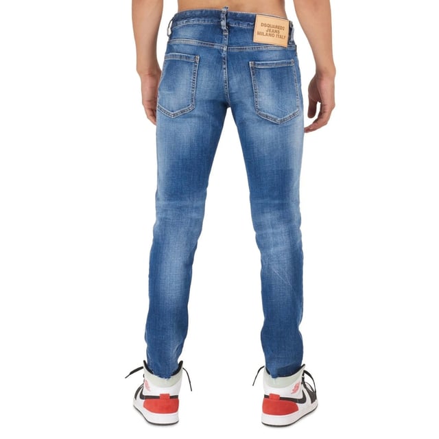 DSQUARED2 Slim Cropped Jeans in navy blue combine style and comfort with a modern slim fit and cropped length, perfect for a contemporary look. Crafted from 99% cotton and 1% elastane, these jeans offer durability with a slight stretch for ease of movement. Their premium denim fabric ensures long-lasting wear, while the sleek design makes them versatile for both casual and smart-casual occasions. Elevate your wardrobe with these stylish, comfortable jeans that blend classic craftsmanship with a trendy edge