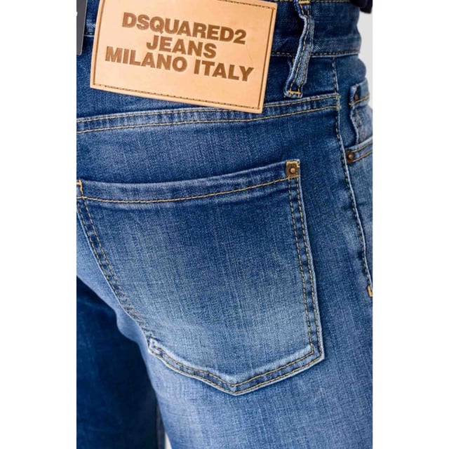 DSQUARED2 Slim Cropped Jeans in navy blue combine style and comfort with a modern slim fit and cropped length, perfect for a contemporary look. Crafted from 99% cotton and 1% elastane, these jeans offer durability with a slight stretch for ease of movement. Their premium denim fabric ensures long-lasting wear, while the sleek design makes them versatile for both casual and smart-casual occasions. Elevate your wardrobe with these stylish, comfortable jeans that blend classic craftsmanship with a trendy edge