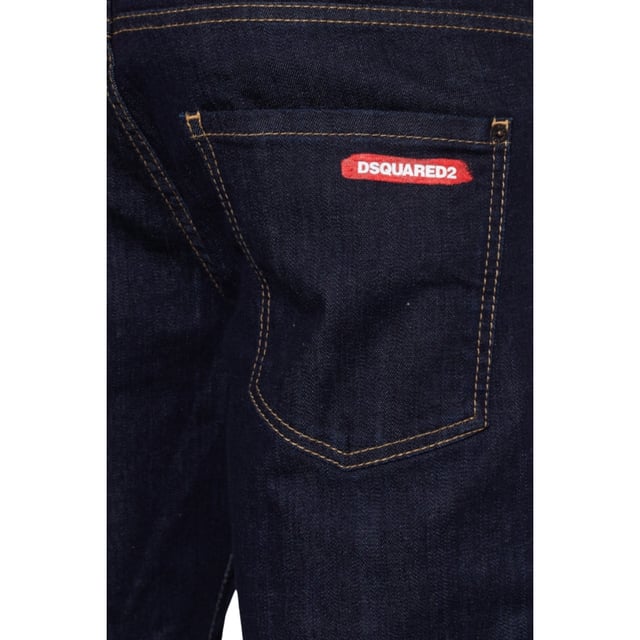 Elevate your wardrobe with the Dsquared2 Sailor Jean in dark blue denim, crafted from a premium blend of 99% cotton and 1% elastane for exceptional comfort and durability. These men's jeans offer a modern fit that moves with you, combining classic sailor-inspired style with contemporary tailoring. The rich navy blue color adds versatility, making them perfect for both casual outings and smart-casual occasions. Designed to provide lasting wear and a flattering silhouette, these jeans are a must-have for those who value quality and style in their everyday attire