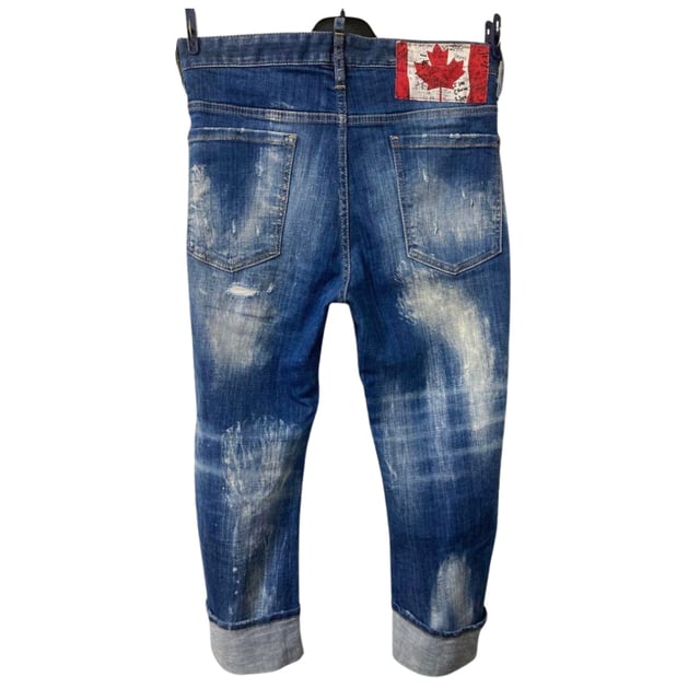 Discover the perfect blend of style and comfort with the Dsquared2 Big Deans Brother Jean in navy blue. Crafted from 98% cotton and 2% elastane, these jeans offer a soft, breathable feel with just the right amount of stretch for all-day wear. The classic blue denim design adds a timeless edge to your wardrobe, while the tailored fit ensures a modern, flattering silhouette. Ideal for casual outings or dressing up with a smart jacket, these jeans combine durability and fashion effortlessly. Elevate your everyday look with a pair that stands out for quality and style