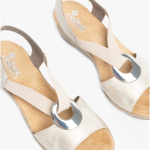 These women's wedge sandals feature a synthetic upper, textile lining, and RIRICON sole for comfort. Slip-on design with a round toe suits casual wear