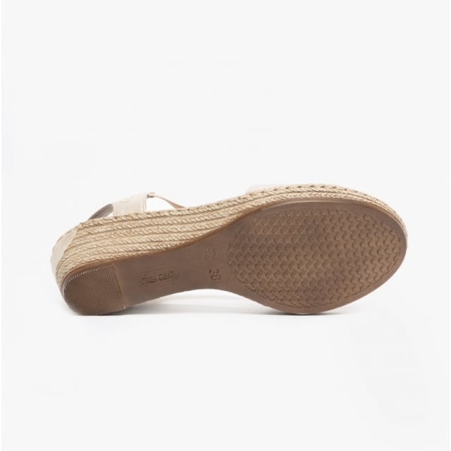 These women's wedge sandals feature a synthetic upper, textile lining, and RIRICON sole for comfort. Slip-on design with a round toe suits casual wear