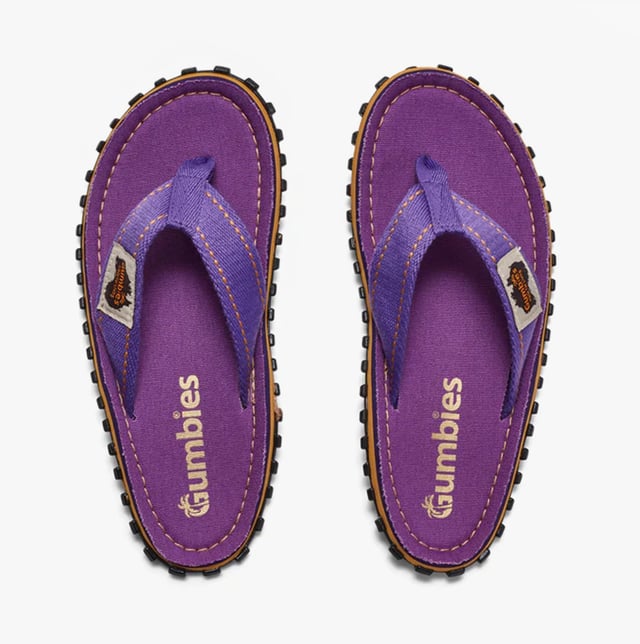 Unisex flip-flops crafted from recycled cotton canvas and rubber offer comfort and lightweight wear. Designed with a toe post and slip-on style for casual, everyday use