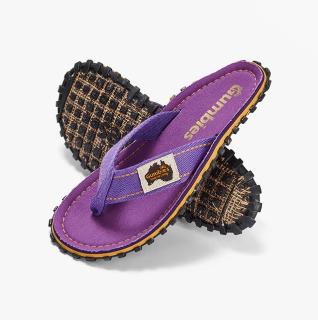Unisex flip-flops crafted from recycled cotton canvas and rubber offer comfort and lightweight wear. Designed with a toe post and slip-on style for casual, everyday use