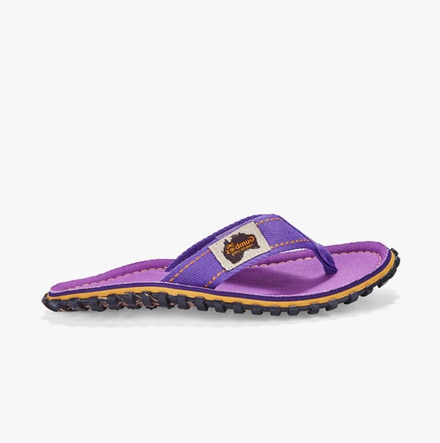 Unisex flip-flops crafted from recycled cotton canvas and rubber offer comfort and lightweight wear. Designed with a toe post and slip-on style for casual, everyday use