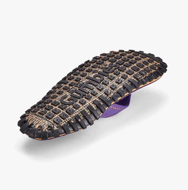 Unisex flip-flops crafted from recycled cotton canvas and rubber offer comfort and lightweight wear. Designed with a toe post and slip-on style for casual, everyday use