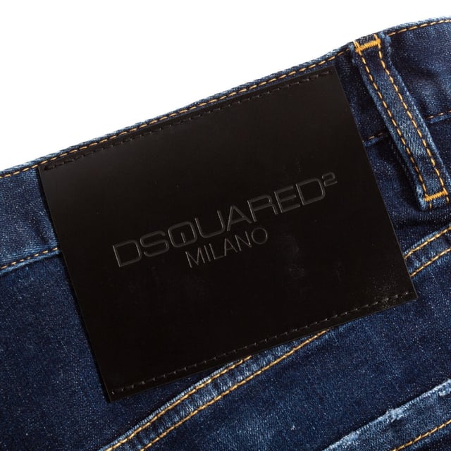 Elevate your wardrobe with the Dsquared2 Combat Jean in dark blue denim, crafted from a premium blend of 98% cotton and 2% elastane for exceptional comfort and durability. These men's jeans combine a classic navy blue shade with a modern combat-inspired design, offering both style and functionality. The slight stretch ensures a perfect fit that moves with you, making them ideal for everyday wear or casual outings. Experience the perfect balance of ruggedness and sophistication with these versatile jeans that effortlessly enhance any look