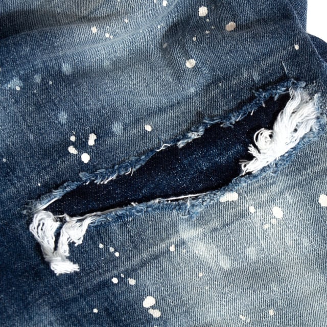 Elevate your wardrobe with the Dsquared2 Combat Jean in dark blue denim, crafted from a premium blend of 98% cotton and 2% elastane for exceptional comfort and durability. These men's jeans combine a classic navy blue shade with a modern combat-inspired design, offering both style and functionality. The slight stretch ensures a perfect fit that moves with you, making them ideal for everyday wear or casual outings. Experience the perfect balance of ruggedness and sophistication with these versatile jeans that effortlessly enhance any look