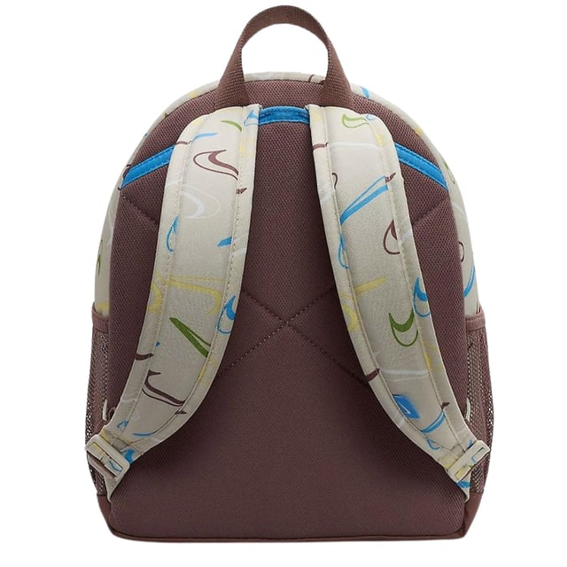The Nike Youth All-Over Brand Logo Cream Bag combines style and practicality for young athletes and everyday use. Crafted from durable 100% polyester, this mini backpack features a cream base with a vibrant, multicoloured Nike Swoosh logo pattern that covers the entire bag, making it stand out. It offers a spacious 11-litre main compartment perfect for books, sports gear, or daily essentials, plus a secure front zip pocket for smaller items. Adjustable straps ensure a comfortable fit, while reliable zip fastenings keep belongings safe. Made in Vietnam, this backpack is a versatile and trendy choice for youth on the go