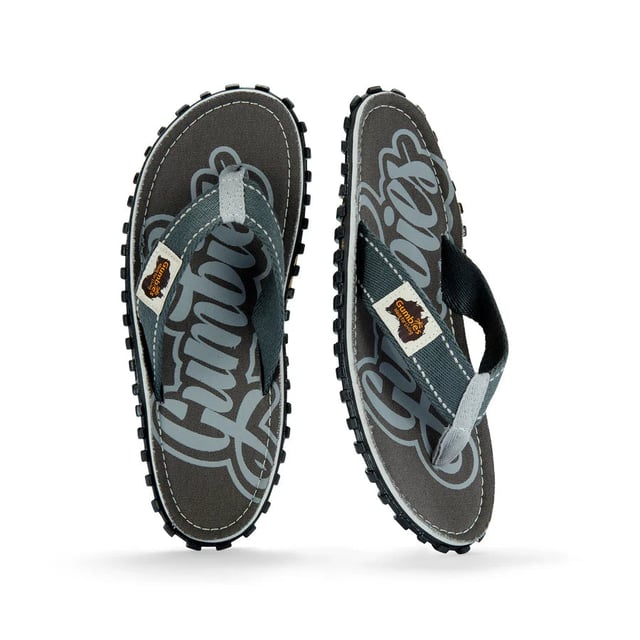Unisex flip-flops made from recycled cotton canvas and rubber offer lightweight, breathable comfort with a slip-on design, round toe shape, and flat heel for casual wear