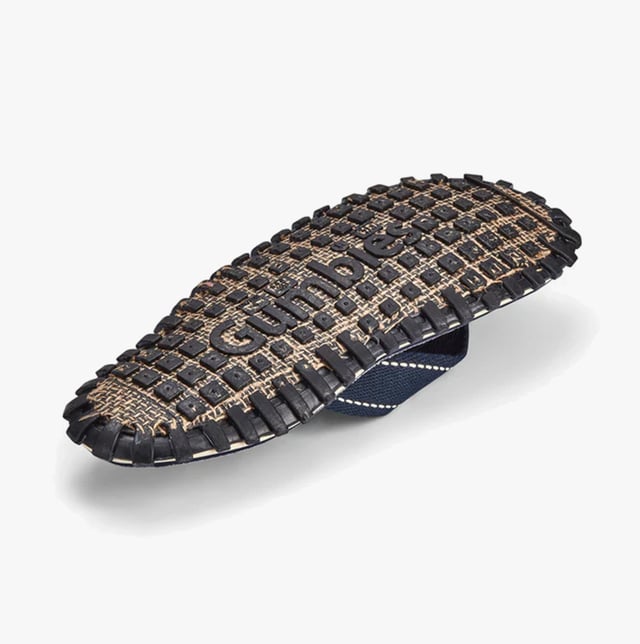 Recycled cotton canvas upper with a breathable lining and recycled rubber sole create lightweight, comfortable flip-flops. Designed with a toe post and round shape for casual wear