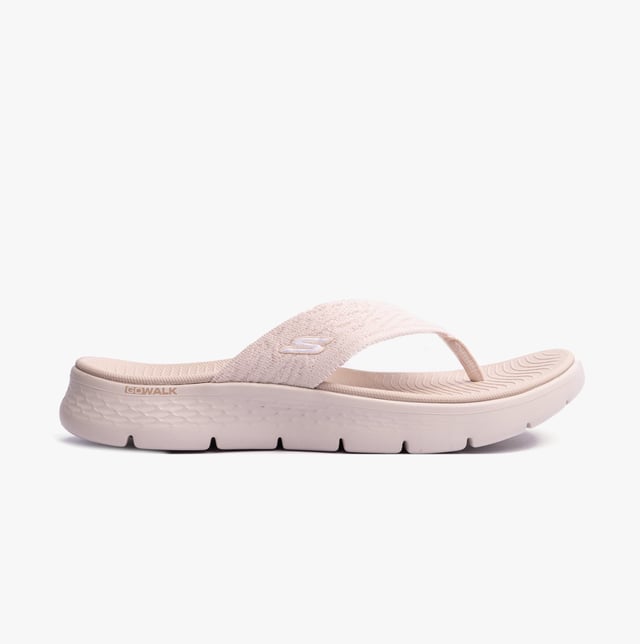 These slip-on women's sandals feature a textile upper and lining with a lightweight EVA sole, offering comfort and vegan-friendly design for casual wear