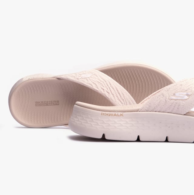 These slip-on women's sandals feature a textile upper and lining with a lightweight EVA sole, offering comfort and vegan-friendly design for casual wear