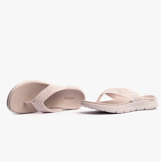 These slip-on women's sandals feature a textile upper and lining with a lightweight EVA sole, offering comfort and vegan-friendly design for casual wear