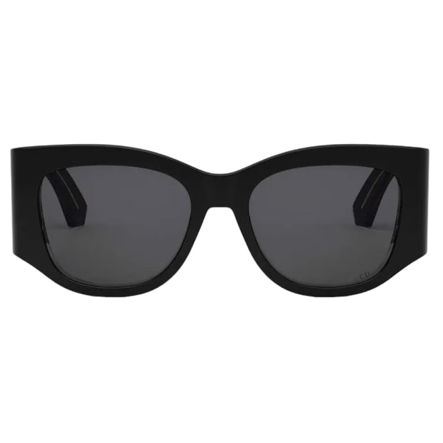 Elevate your style with the Dior DIORNUIT Black Sunglasses, featuring a sleek black frame paired with sophisticated smoke lenses. Designed for women who appreciate timeless elegance, these sunglasses offer both fashion and function by providing excellent protection against glare and UV rays. Their bold yet refined design complements any outfit, making them the perfect accessory for sunny days or stylish outings. Experience luxury eyewear that enhances your confidence and completes your look effortlessly. Made In Italy 100% Plastic