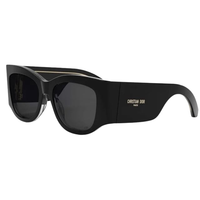 Elevate your style with the Dior DIORNUIT Black Sunglasses, featuring a sleek black frame paired with sophisticated smoke lenses. Designed for women who appreciate timeless elegance, these sunglasses offer both fashion and function by providing excellent protection against glare and UV rays. Their bold yet refined design complements any outfit, making them the perfect accessory for sunny days or stylish outings. Experience luxury eyewear that enhances your confidence and completes your look effortlessly. Made In Italy 100% Plastic