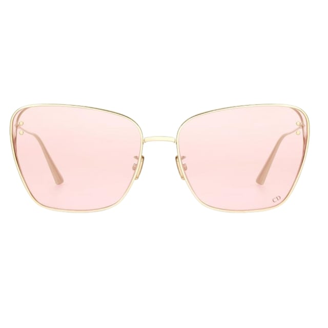 Elevate your style with the Dior MissDior Gold Framed Pink Lens Sunglasses, designed for women who appreciate luxury and elegance. Featuring a striking gold frame that adds a touch of sophistication, these sunglasses are complemented by soft pink lenses that not only protect your eyes but also enhance your look with a subtle, feminine hue. Perfect for sunny days or making a fashion statement, they combine high-end craftsmanship with timeless design, ensuring you stand out effortlessly wherever you go. Experience the perfect blend of comfort, protection, and iconic Dior style. Made In Italy 100% Metal