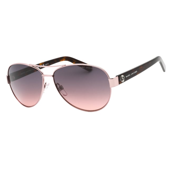 Discover the perfect blend of style and sophistication with the Marc Jacobs Pink Havana Sunglasses. Featuring a chic pink Havana frame paired with grey fuchsia lenses, these sunglasses offer a unique and fashionable look for women. Designed with precise measurements (60x13x135), they provide a comfortable fit while enhancing your everyday outfits. Whether you're heading to a sunny brunch or a casual day out, these sunglasses add a touch of luxury and vibrant color to your ensemble. Elevate your accessory game with this standout piece from Marc Jacobs. 100% Plastic